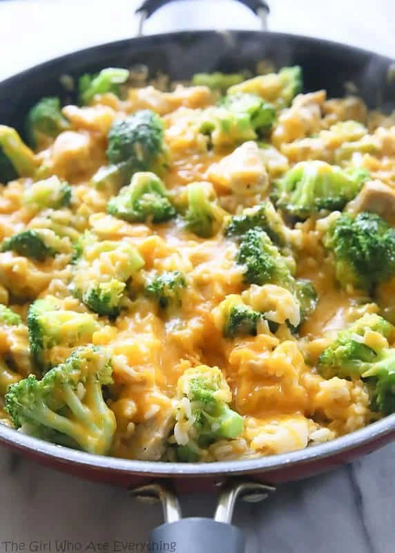 Cheesy chicken broccoli rice bake dish served in a bowl