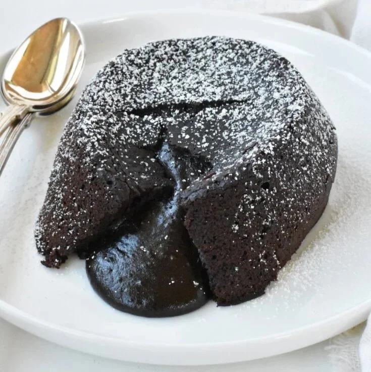 Easiest no-egg chocolate lava cake served with a scoop of vanilla ice cream
