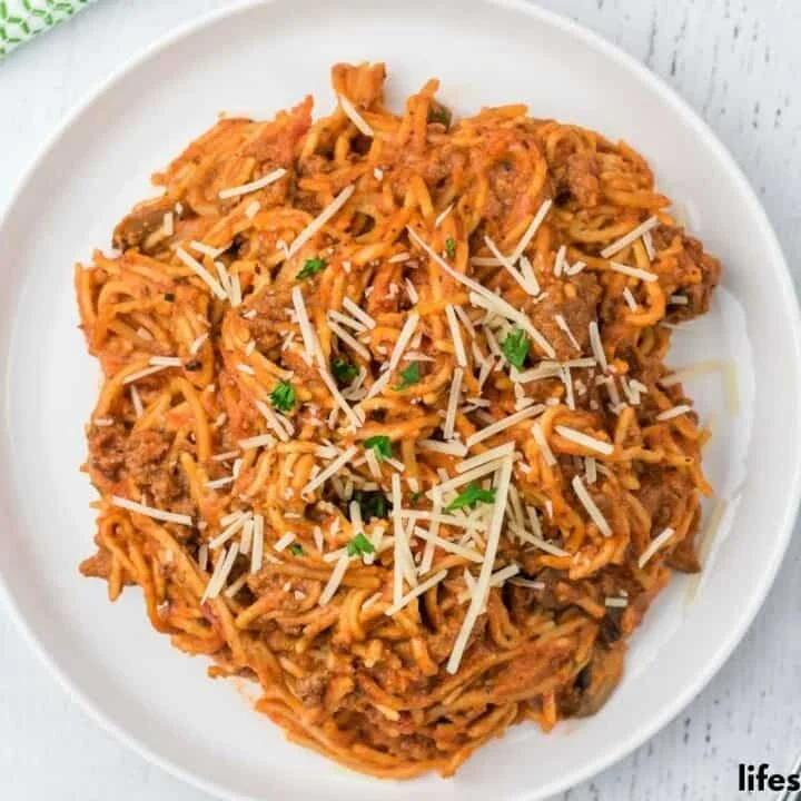 Delicious Crockpot spaghetti served in a bowl, showcasing easy recipe preparation.
