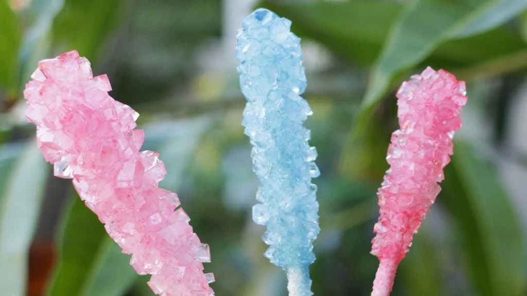 Colorful homemade rock candy displayed in a jar