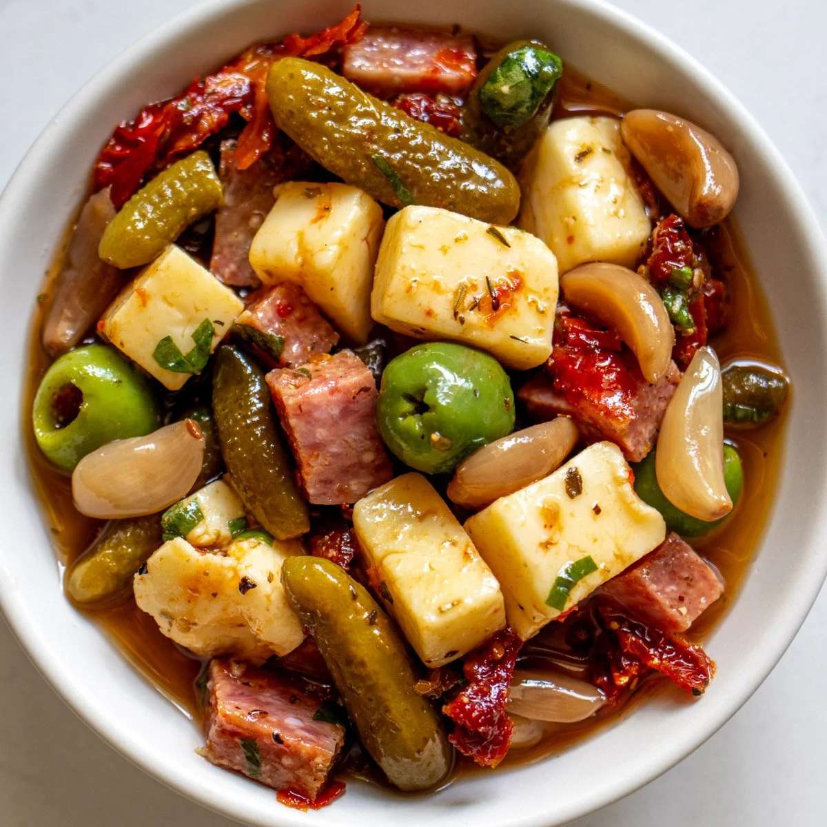 Salami, Pickles and Marinated Cheese Bites