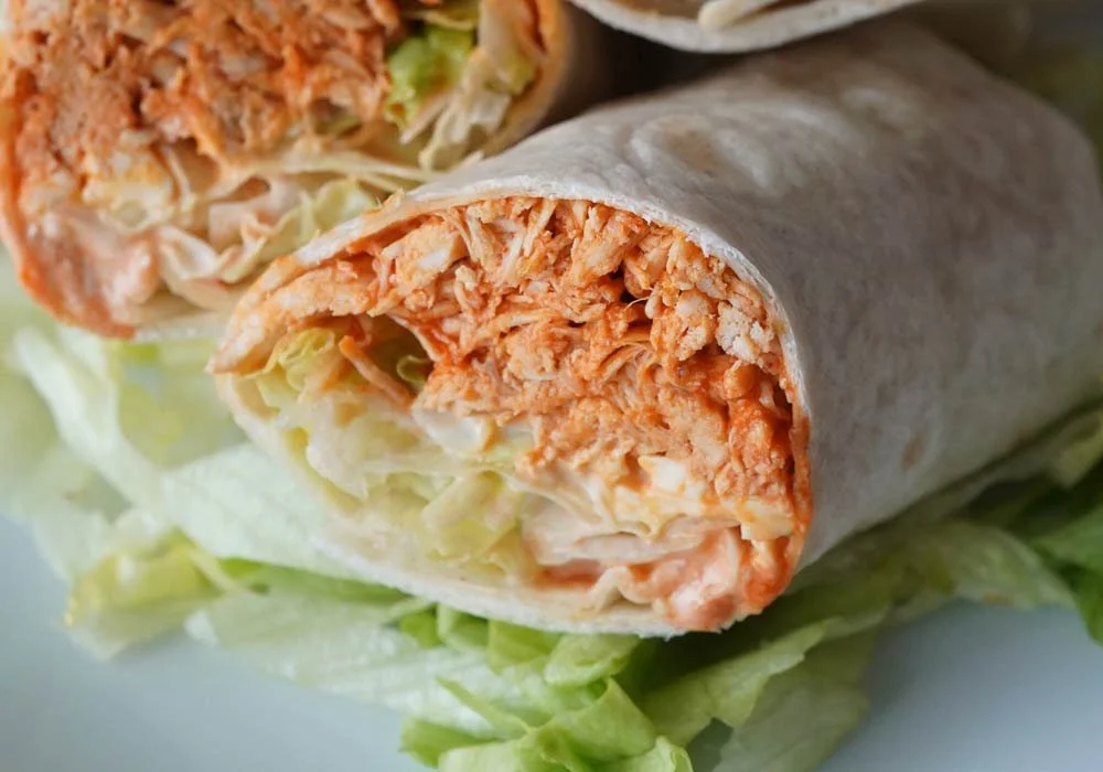 Delicious Spicy Buffalo Ranch Chicken Wrap with chicken and spicy sauce